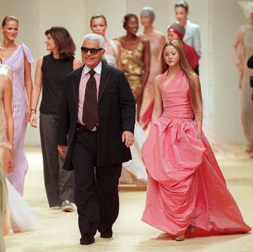 german designer karl lagerfeld c appears on the catwalk after the 1999 springsummer haute couture show of the chanel fashion house in paris 19 january photo by pierre verdy afp photo credit should read pierre verdyafp via getty images
